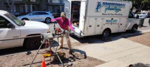 Plumber Threading Gas Pipe for a Backyard BBQ in Costa Mesa