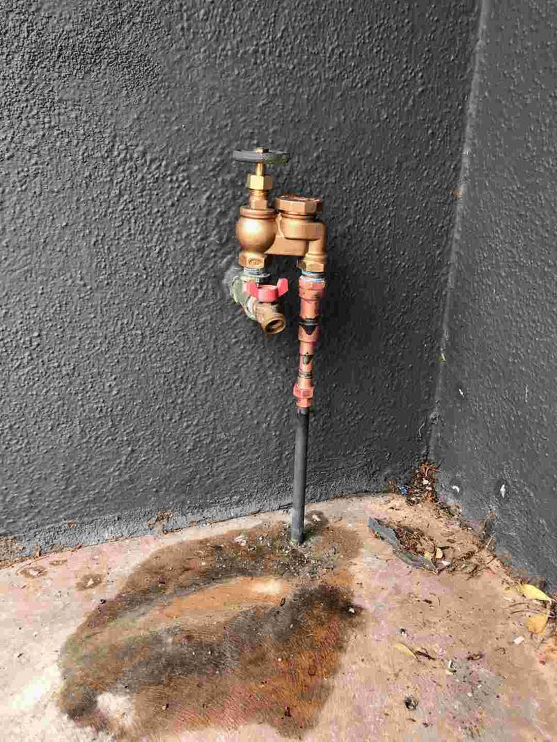 repair-service-pool-filler-isolation-valve-orange-county Manual pool-filler isolation valve and copper riser at an Orange County home