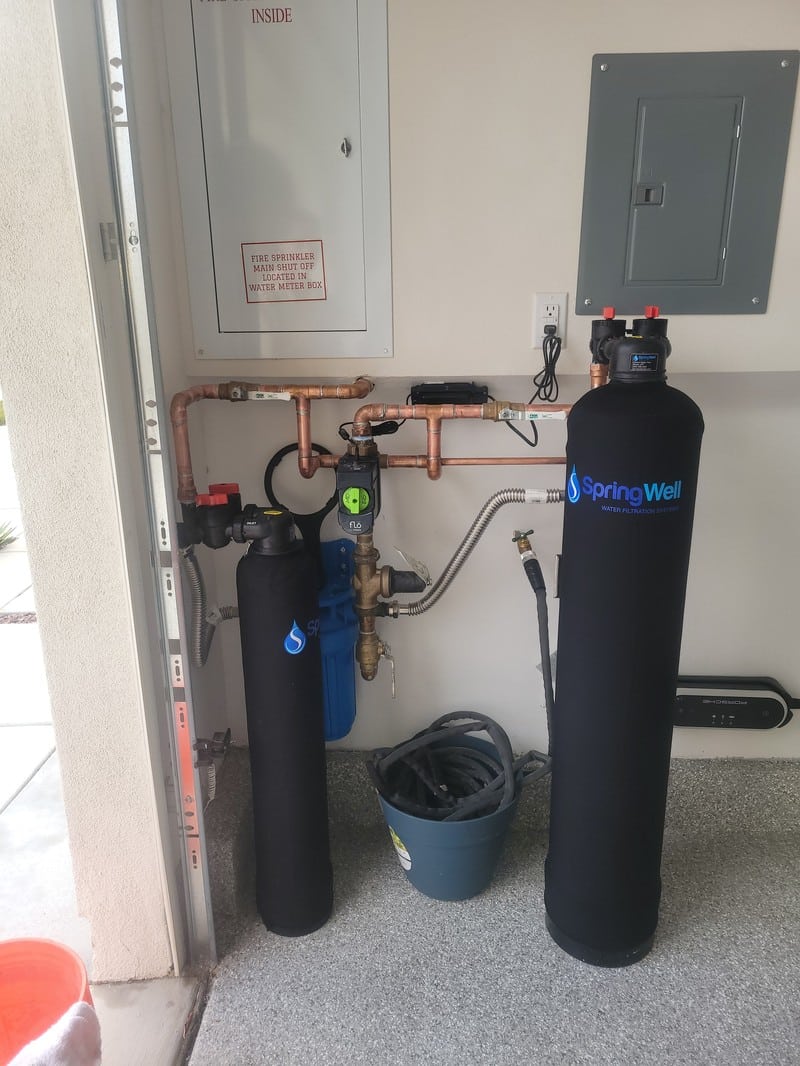 repair-service-water-softener-bypass-system-tustin Whole-house water softener with bypass valves on a residential supply line in Orange County