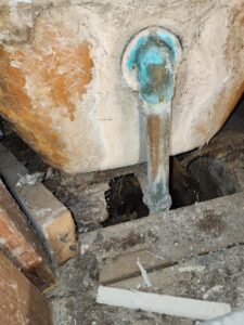 slab-leak-corroded-copper-pipe-closeup-orange-county Copper pipe corrosion with blue-green oxidation, the kind of pinhole failure that leads to under-slab leaks